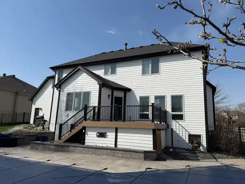 Newly installed siding on an Omaha home completed by Royalty Roofing and Siding